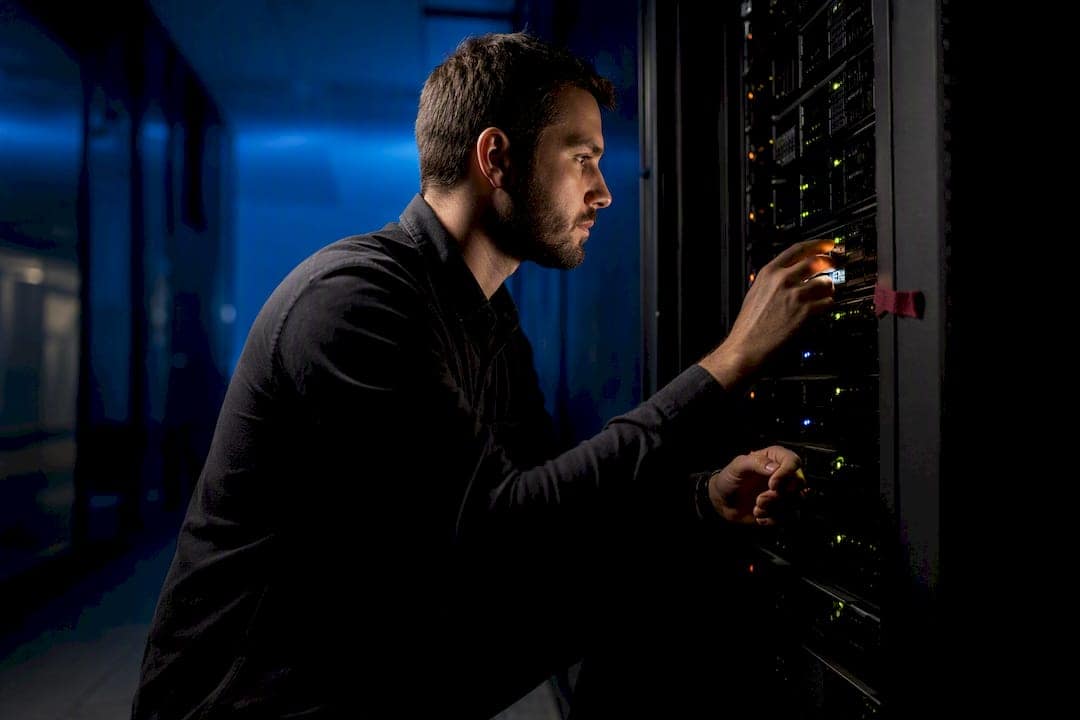 Technician checking servers during website migration